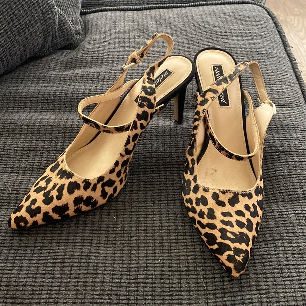 Faux fur leopard print pointed toe 2 inch stiletto heels.